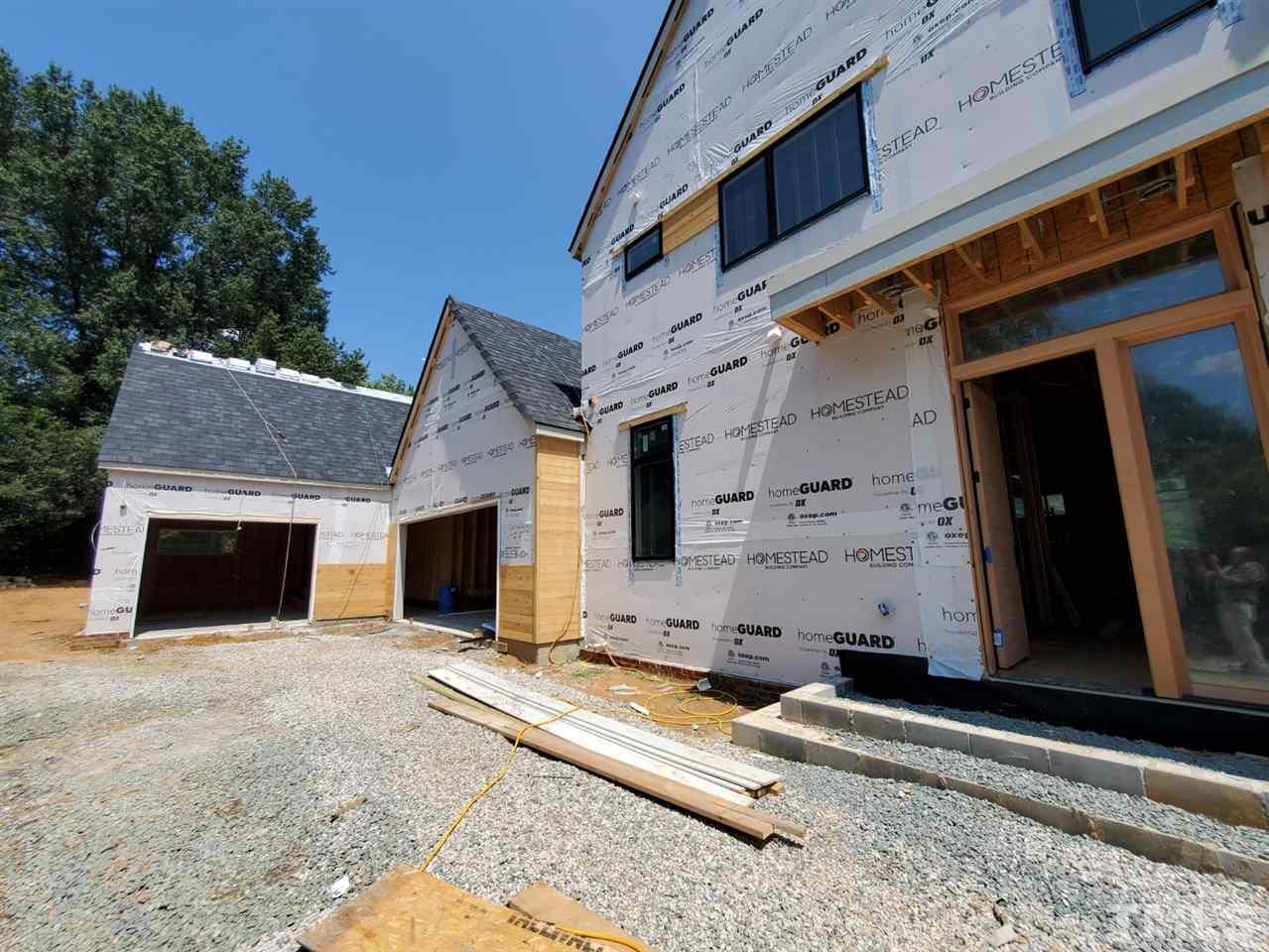 109 Dartmouth Road Raleigh, NC 27609 - Photo 21 of 24 a view of house with yard