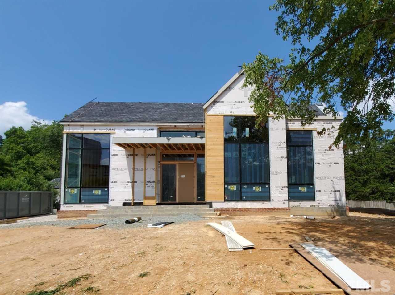 109 Dartmouth Road Raleigh, NC 27609 - Photo 6 of 24 a view of a house with a patio