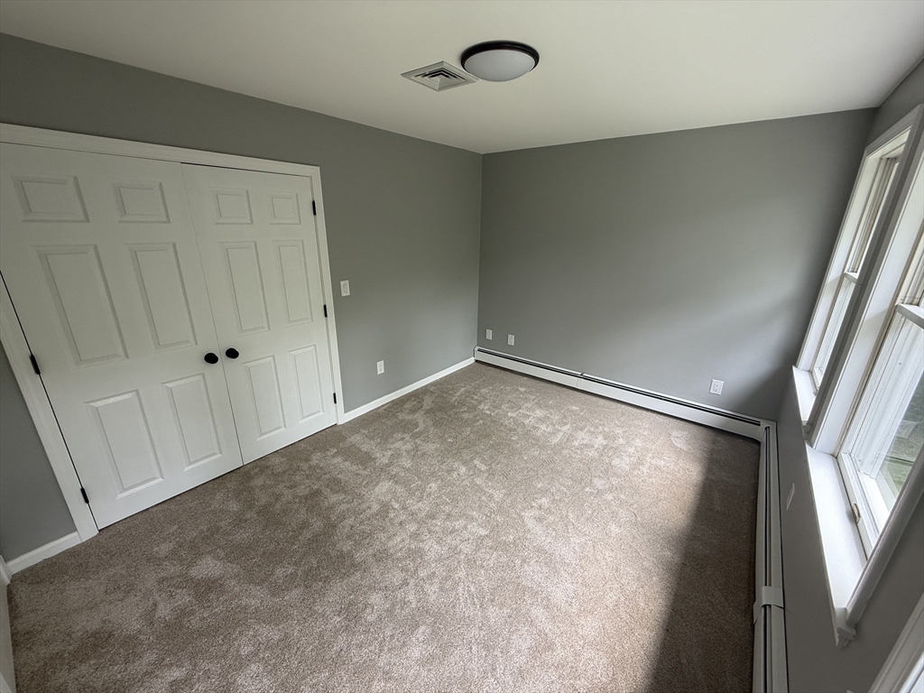 295 Frenchtown Road East Greenwich, RI 02818 - Photo 18 of 26 an empty room with windows