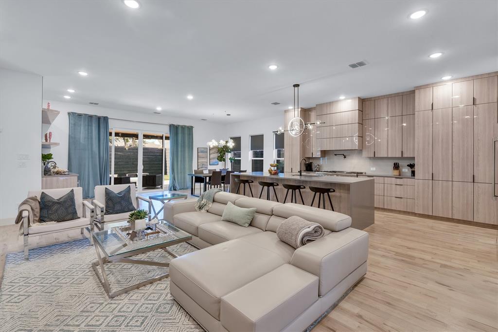 7519 Robin Road Dallas, TX 75209 - Photo 20 of 40 a living room with lots of furniture and view of kitchen