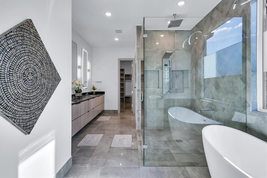 7519 Robin Road Dallas, TX 75209 - Photo 27 of 40 a bathroom with a sink a toilet and shower