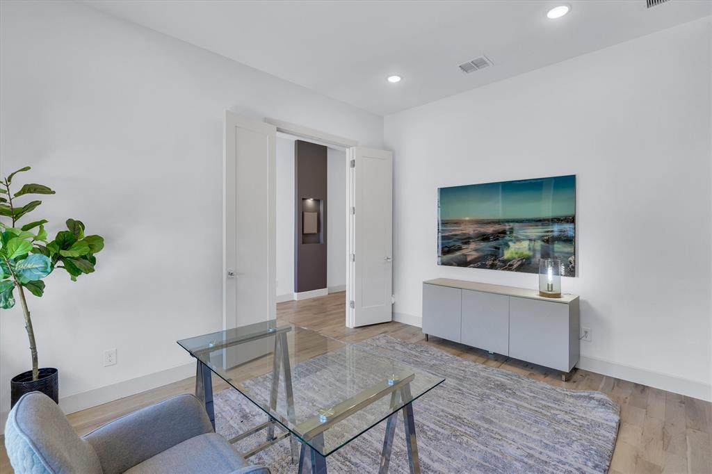 7519 Robin Road Dallas, TX 75209 - Photo 34 of 40 a living room with furniture and a potted plant