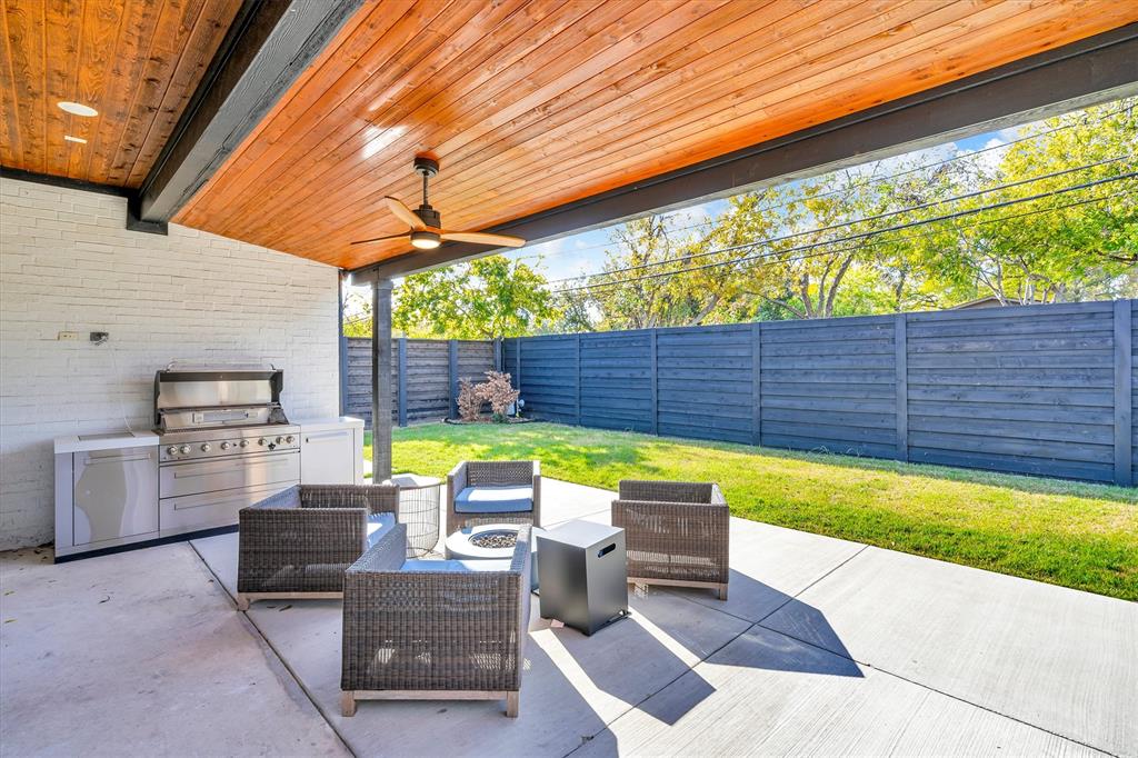 7519 Robin Road Dallas, TX 75209 - Photo 36 of 40 a view of a chairs and table in the patio
