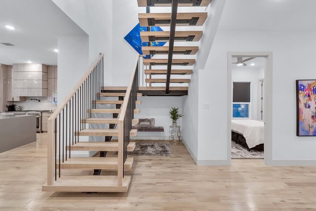 7519 Robin Road Dallas, TX 75209 - Photo 6 of 40 a view of entryway and hall with wooden floor