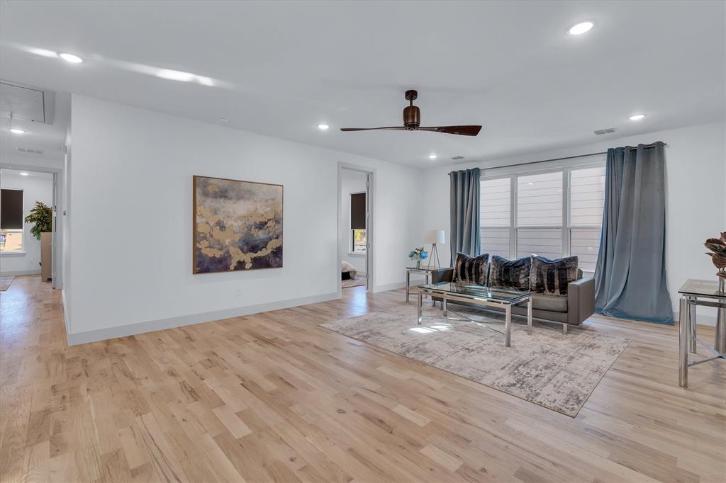 7519 Robin Road Dallas, TX 75209 - Photo 7 of 40 a living room with furniture and a large window