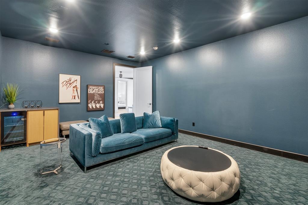 7519 Robin Road Dallas, TX 75209 - Photo 9 of 40 a living room with furniture and a wooden floor