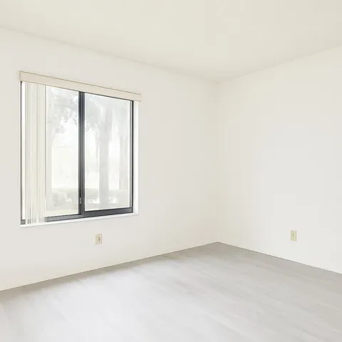 an empty room with a window