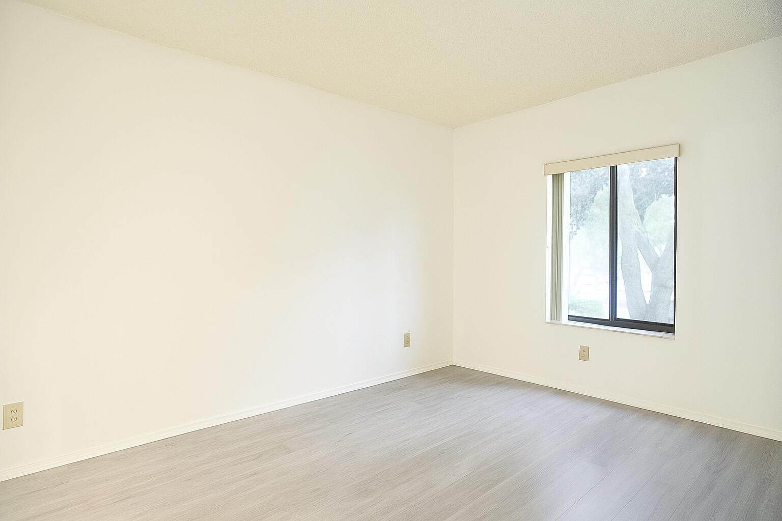 209 Foxtail Drive, Unit D2 Greenacres, FL 33415 - Photo 10 of 11 an empty room with a window