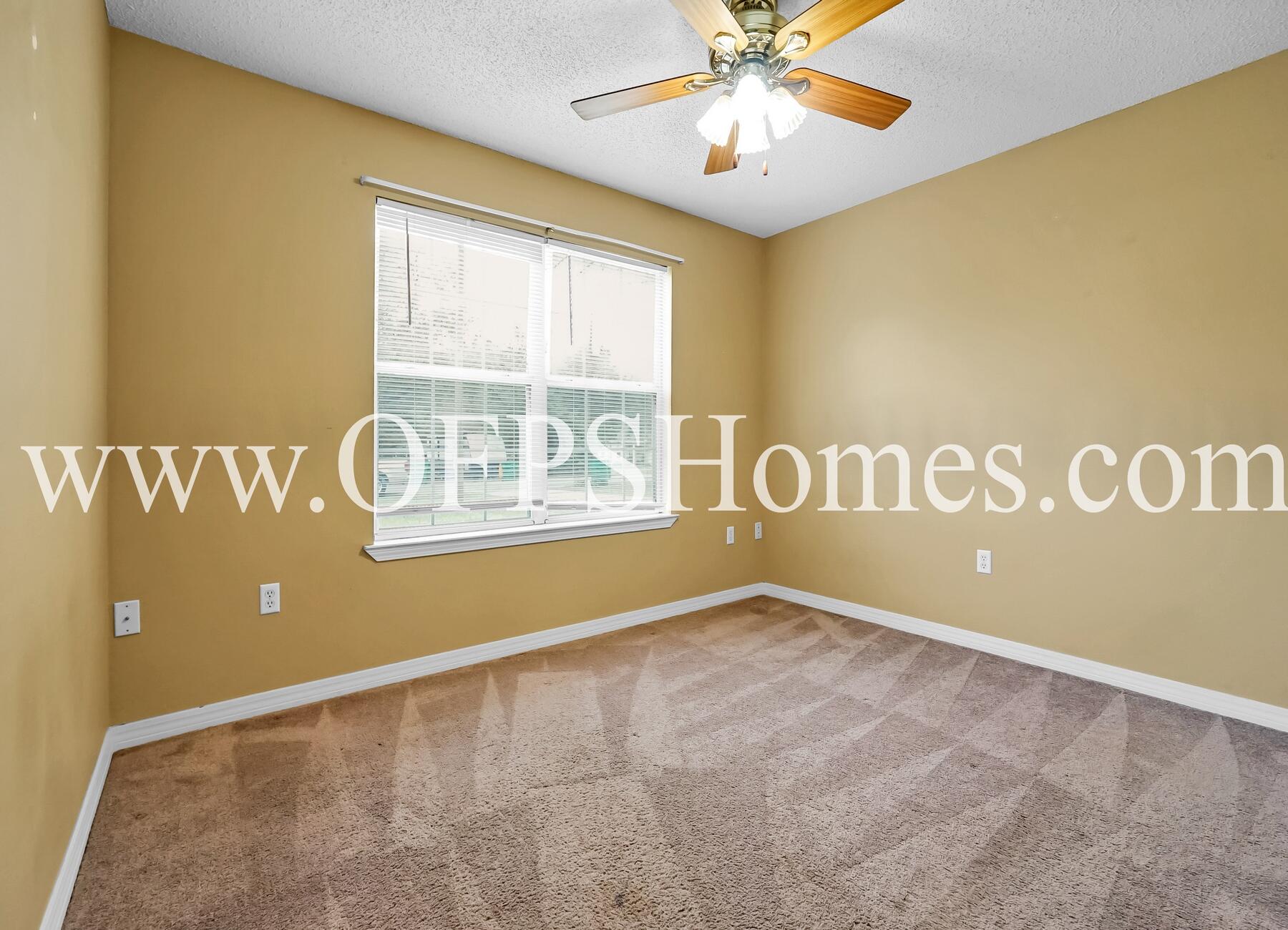 2953 Sholtz Avenue Crestview, FL 32539 - Photo 23 of 33 a view of an empty room with a window