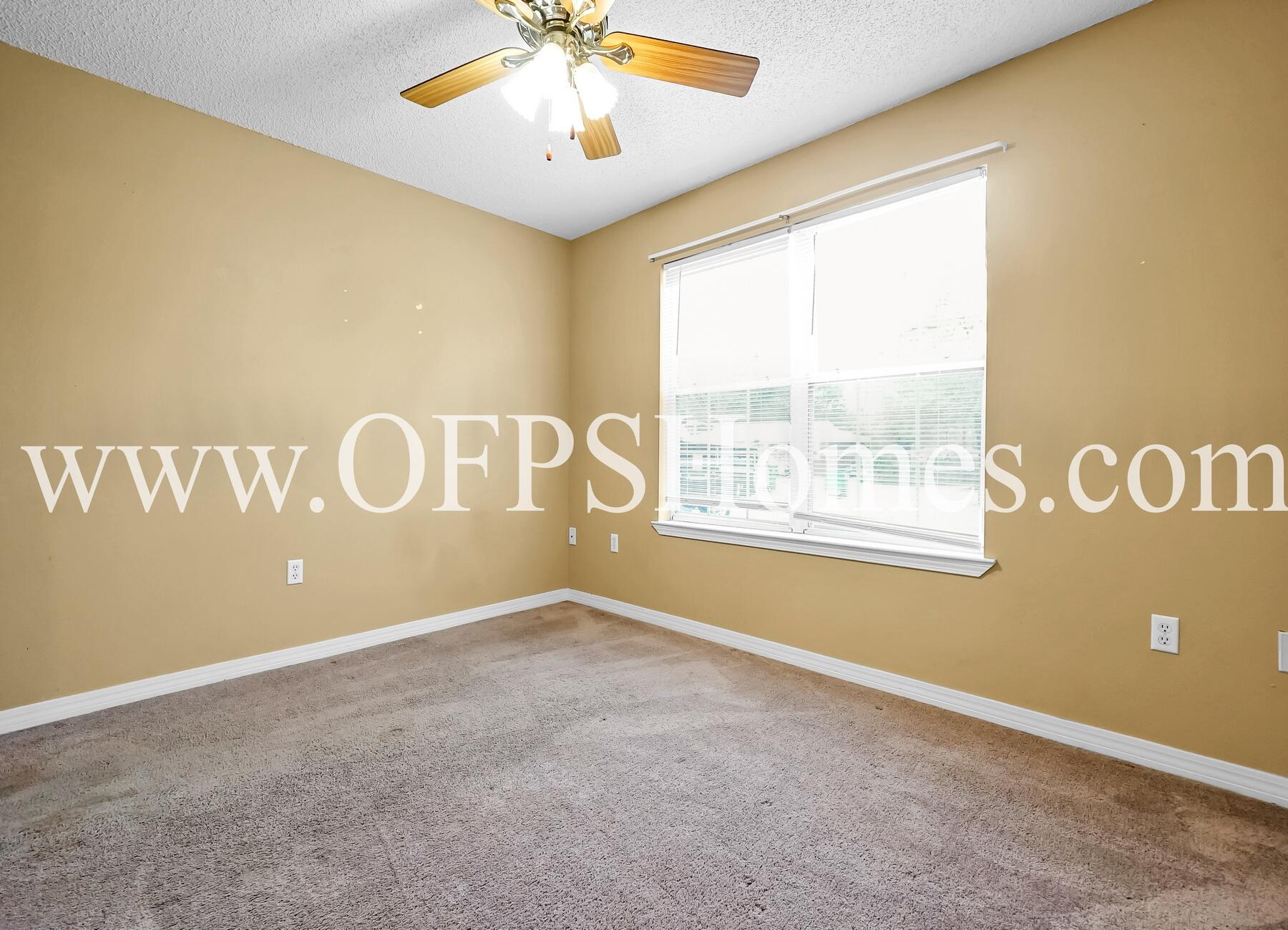 2953 Sholtz Avenue Crestview, FL 32539 - Photo 25 of 33 a view of an empty room with a window