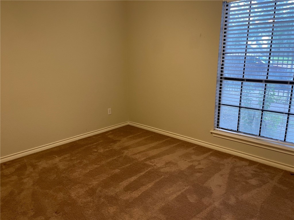 4022 Wood River Drive, Unit 5C Corpus Christi, TX 78410 - Photo 7 of 10 close up of a wall