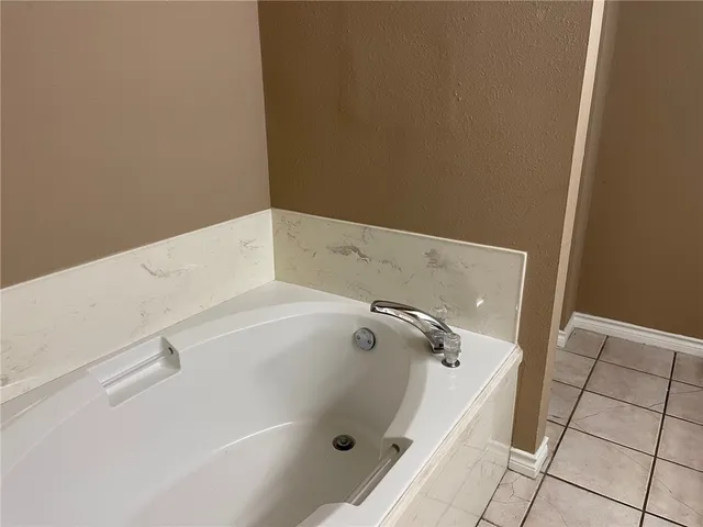 a bathroom with a bathtub