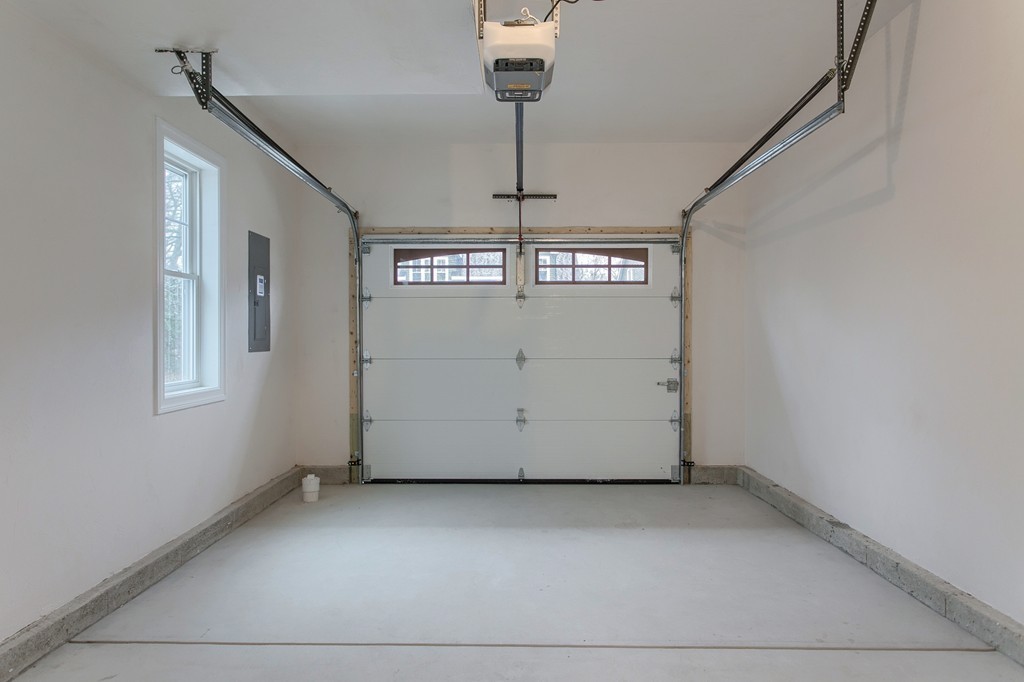 18 Jaclyn's Way, Unit 19 Billerica, MA 01821 - Photo 16 of 16 a view of a garage with window