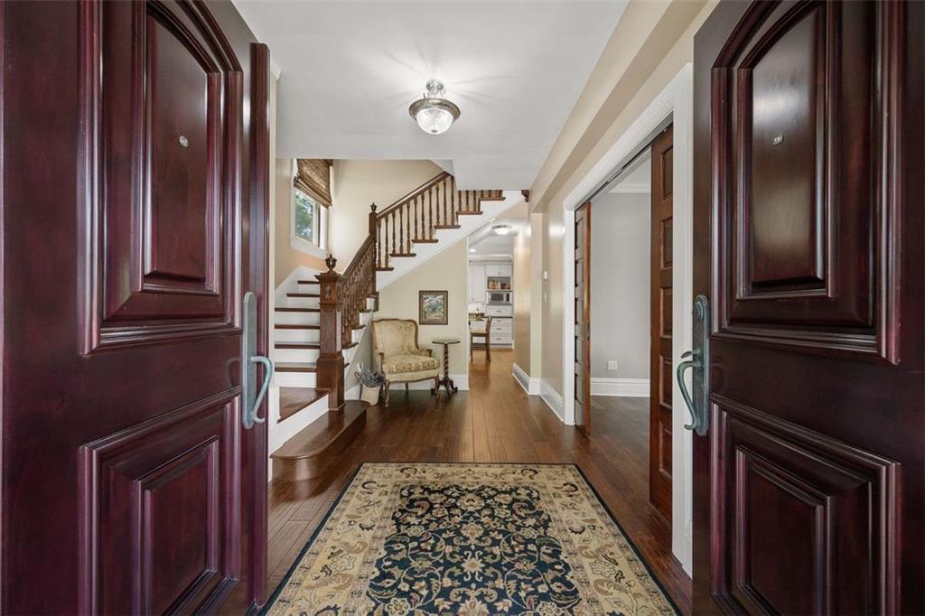209 Chestnut Road Sewickley, PA 15143 - Photo 14 of 49 a view of entryway and hall with wooden floor
