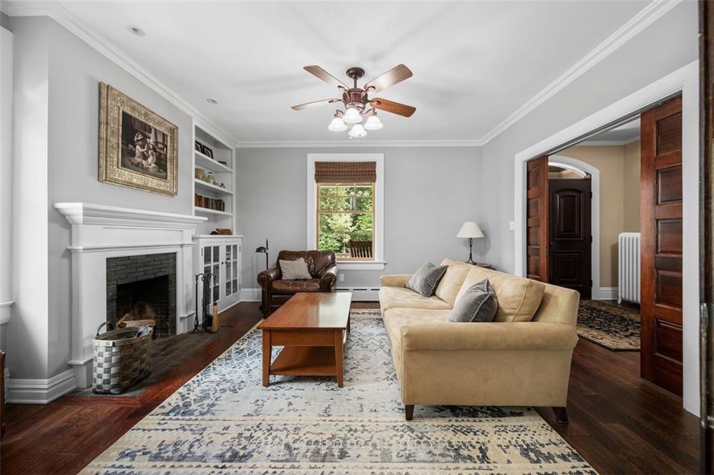 209 Chestnut Road Sewickley, PA 15143 - Photo 19 of 49 a living room with furniture fireplace and window