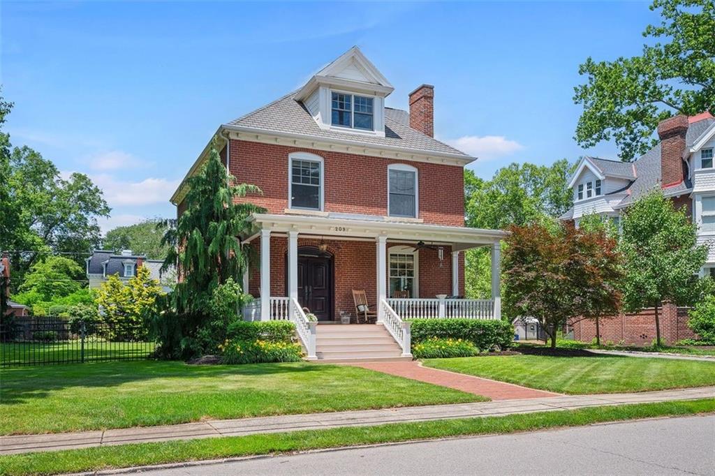 209 Chestnut Road Sewickley, PA 15143 - Photo 2 of 49 a front view of a house with a yard