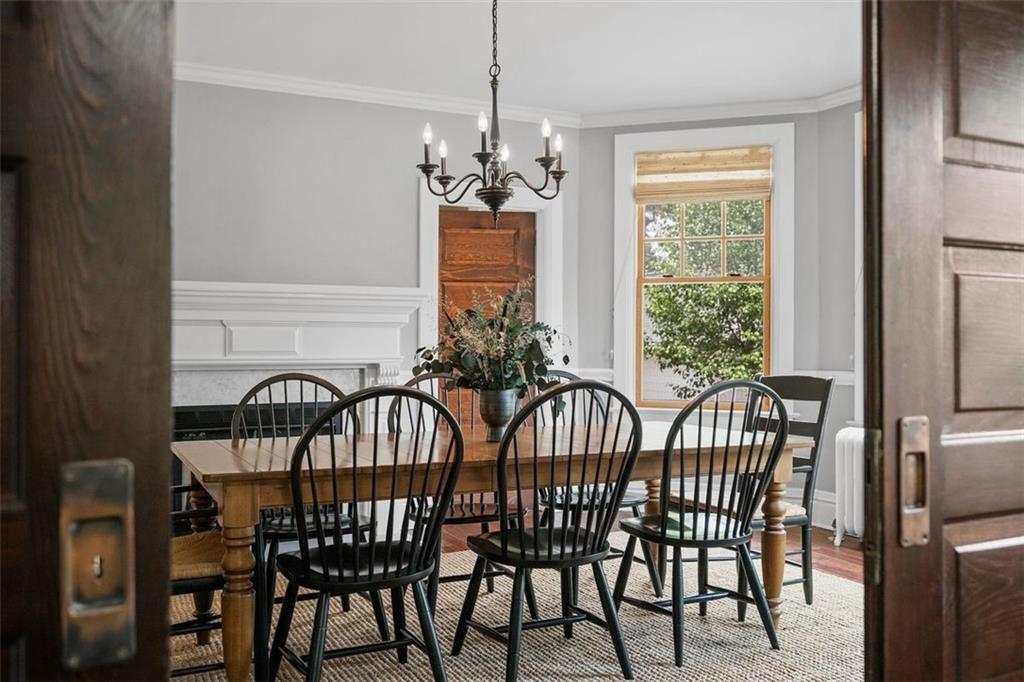 209 Chestnut Road Sewickley, PA 15143 - Photo 21 of 49 a view of a dining room with furniture window and outside view