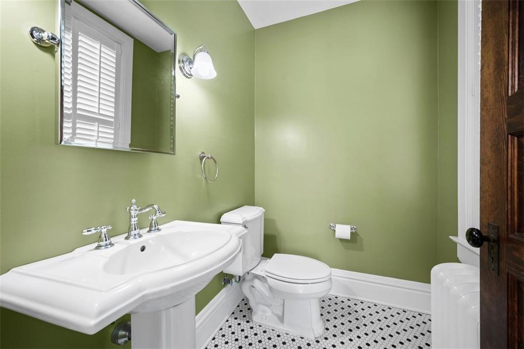 209 Chestnut Road Sewickley, PA 15143 - Photo 25 of 49 a bathroom with a sink and a toilet