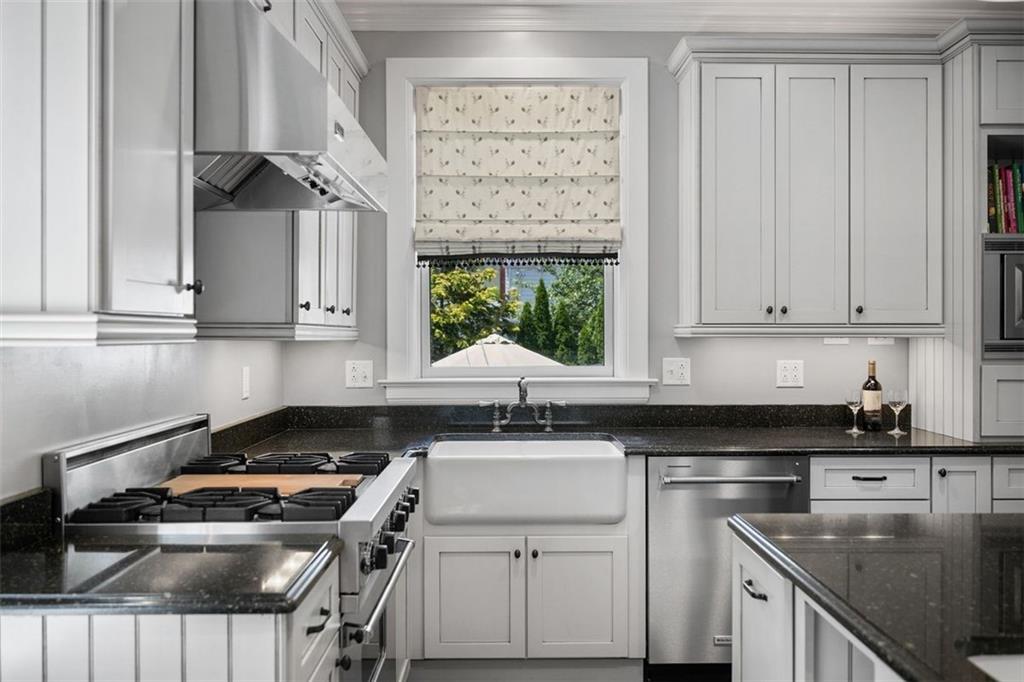 209 Chestnut Road Sewickley, PA 15143 - Photo 29 of 49 a kitchen with a sink cabinets and window