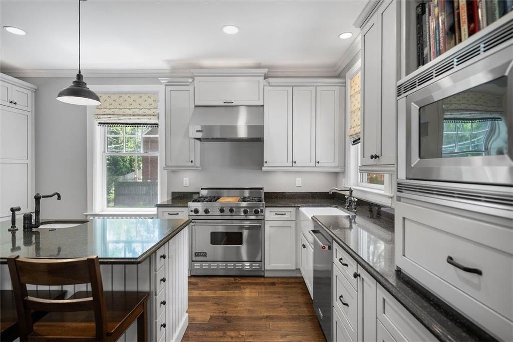 209 Chestnut Road Sewickley, PA 15143 - Photo 31 of 49 a kitchen with stainless steel appliances granite countertop a stove and a sink
