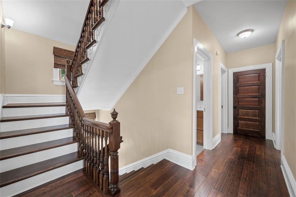 209 Chestnut Road Sewickley, PA 15143 - Photo 36 of 49 a view of entryway with stairs and wooden floor