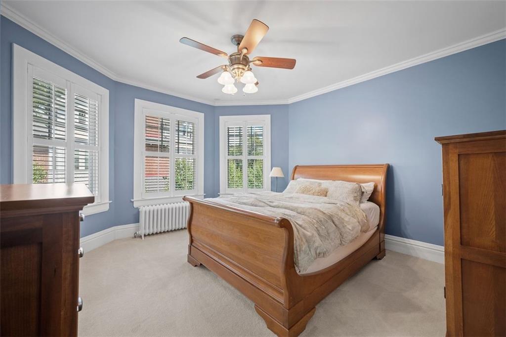 209 Chestnut Road Sewickley, PA 15143 - Photo 37 of 49 a bed sitting in a spacious bedroom next to a window