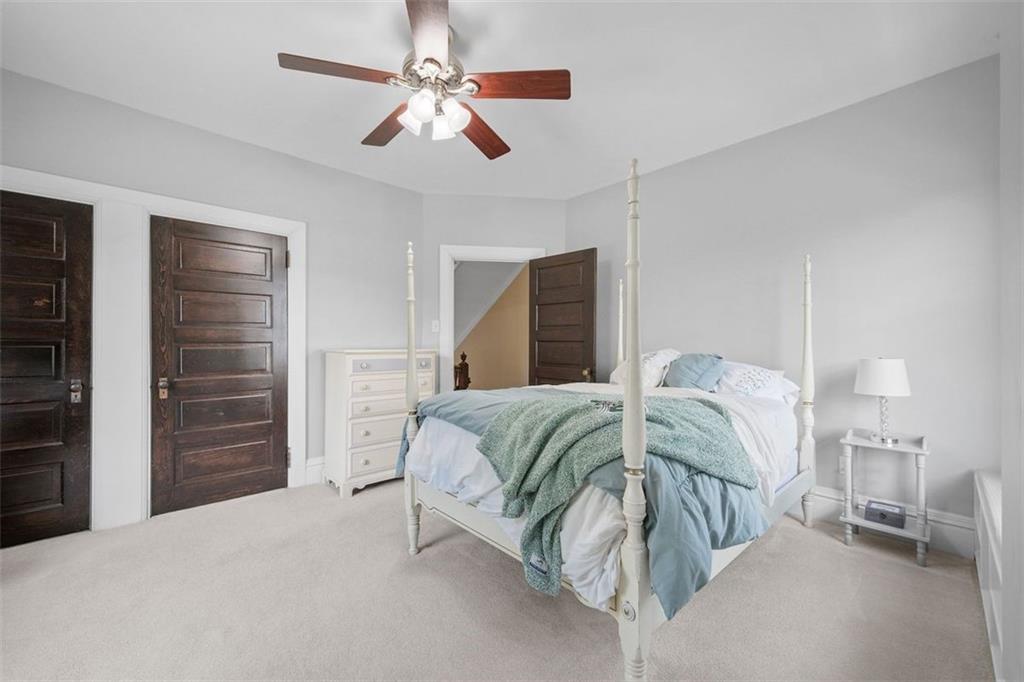 209 Chestnut Road Sewickley, PA 15143 - Photo 40 of 49 a bedroom with a bed and a walk in closet