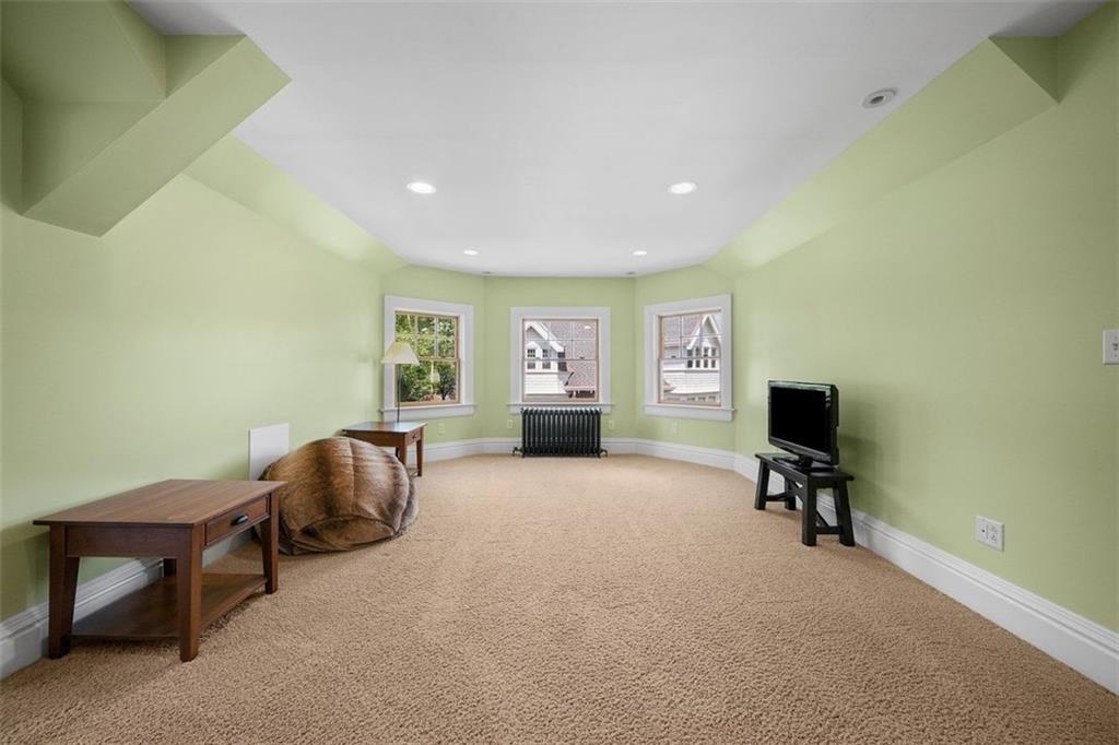 209 Chestnut Road Sewickley, PA 15143 - Photo 44 of 49 a living room with furniture and a flat screen tv