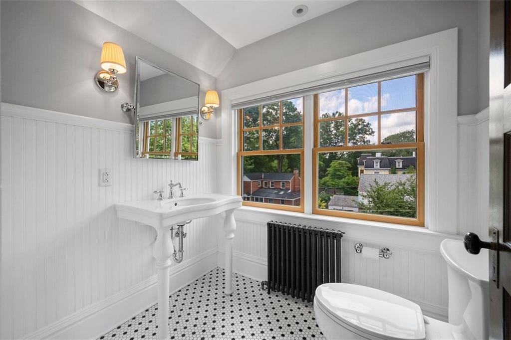 209 Chestnut Road Sewickley, PA 15143 - Photo 46 of 49 a bathroom with a sink a toilet a window and shower