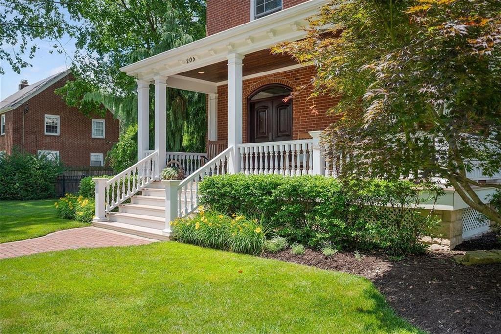 209 Chestnut Road Sewickley, PA 15143 - Photo 6 of 49 a front view of a house with a yard