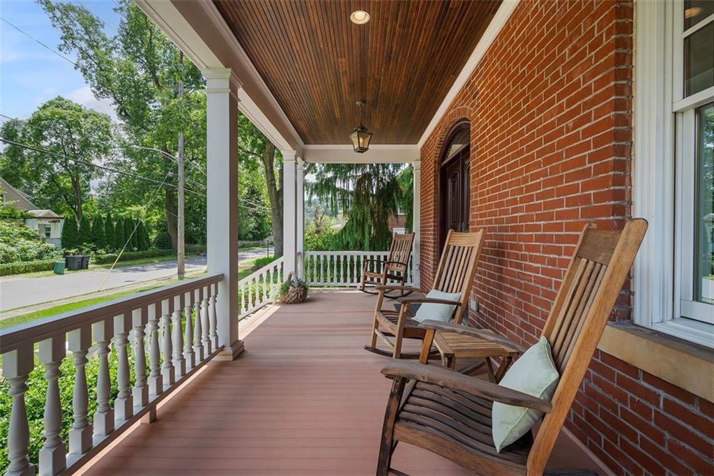 209 Chestnut Road Sewickley, PA 15143 - Photo 9 of 49 a view of a chair and tables in the balcony
