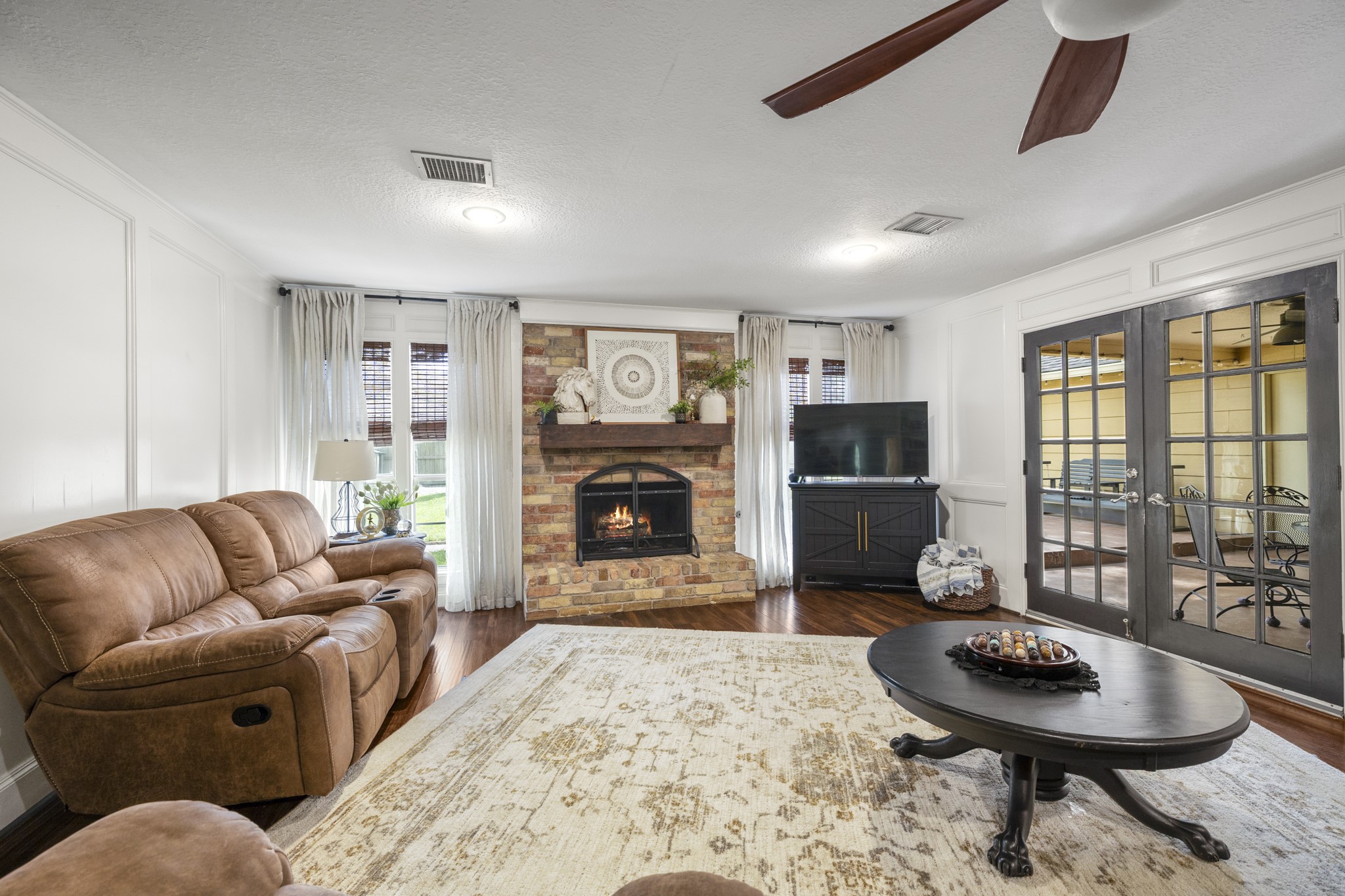 17627 Forest Mist Drive Spring, TX 77379 - Photo 8 of 32 The living room with double doors leading to the covered patio.