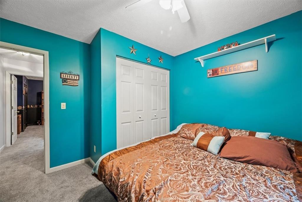 0 Grange Road Beaver Falls, PA 15010 - Photo 20 of 50 a bedroom with a bed and a mirror