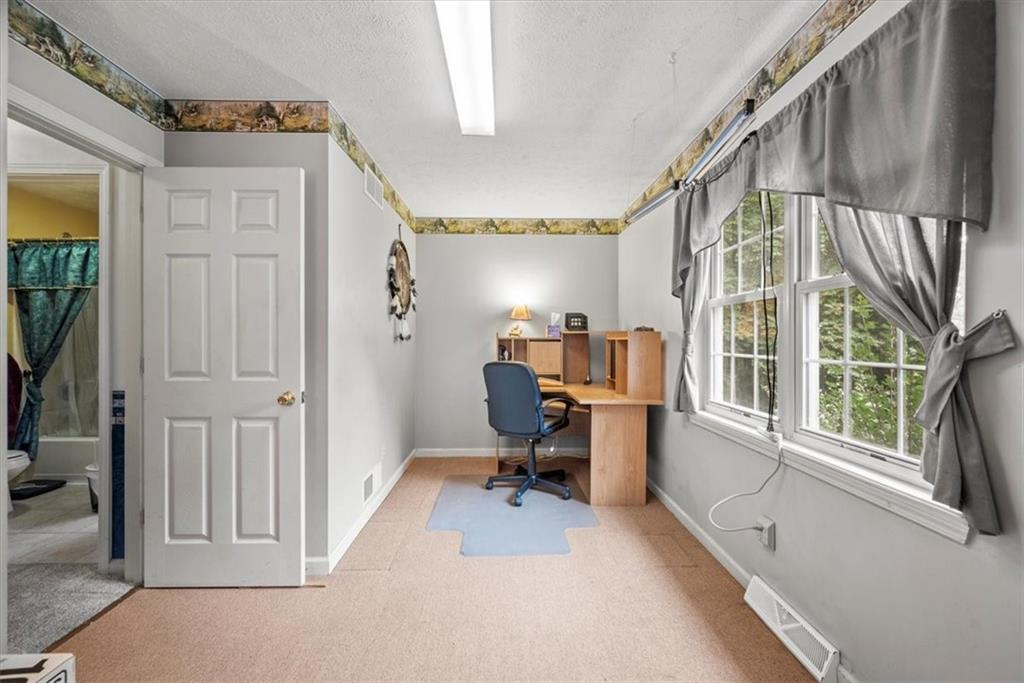 0 Grange Road Beaver Falls, PA 15010 - Photo 36 of 50 a view of a workspace with furniture and a window