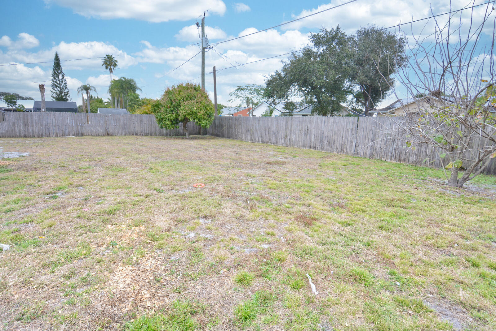 2181 Southeast Midtown Road Port St. Lucie, FL 34952 - Photo 35 of 41 backyard mostly fenced in