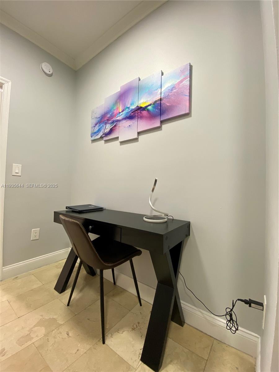 1750 Northwest 107th Avenue, Unit R509 Sweetwater, FL 33172 - Photo 10 of 23 a view of a workspace with furniture