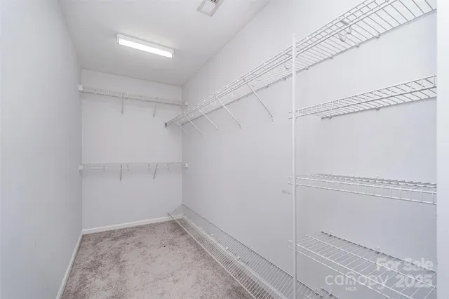 a view of a room with racks on the wall