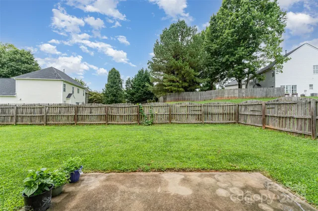 a view of a backyard with a garden