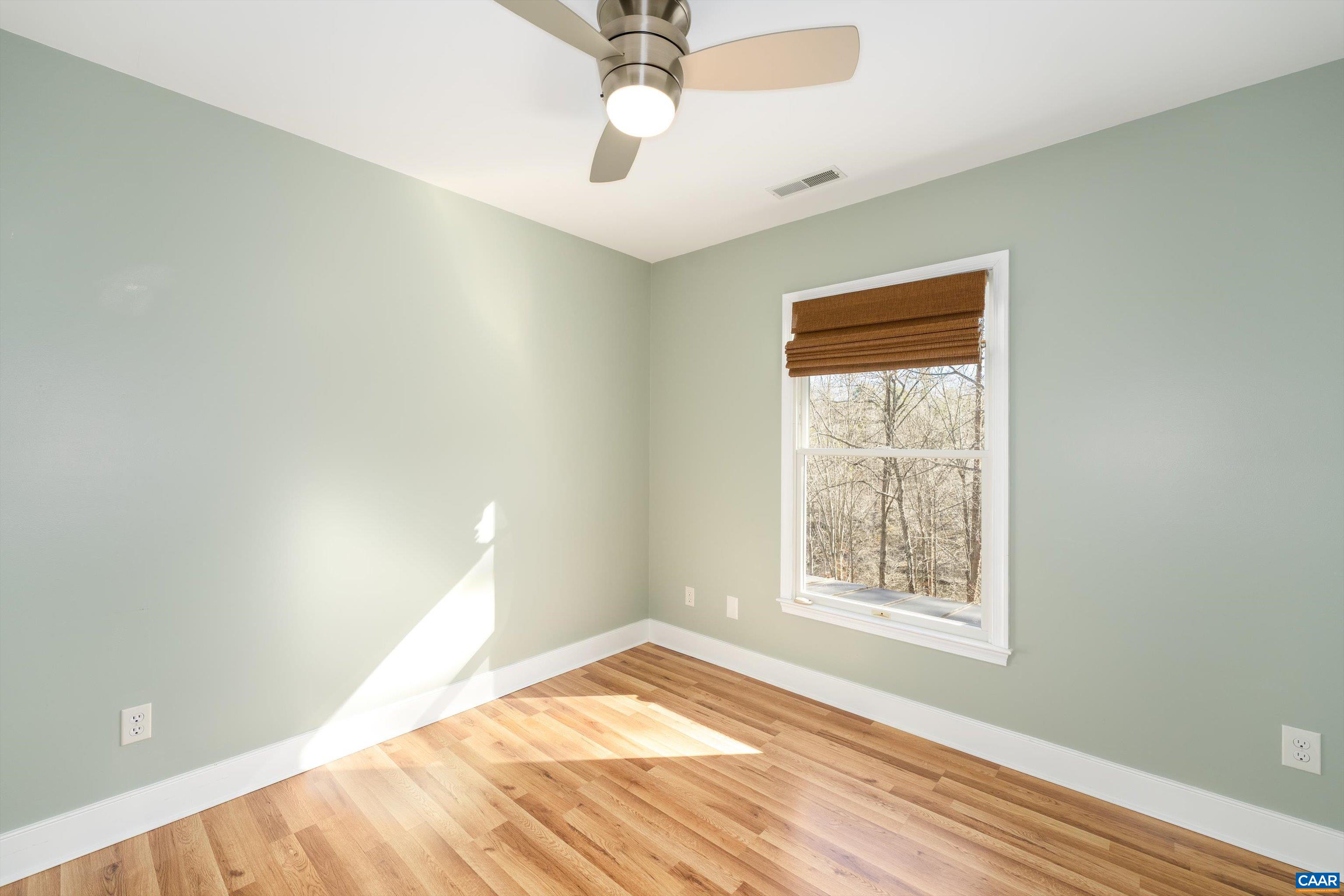 9 Vine Ridge Drive Palmyra, VA 22963 - Photo 57 of 72 a view of a room with a ceiling fan and a window
