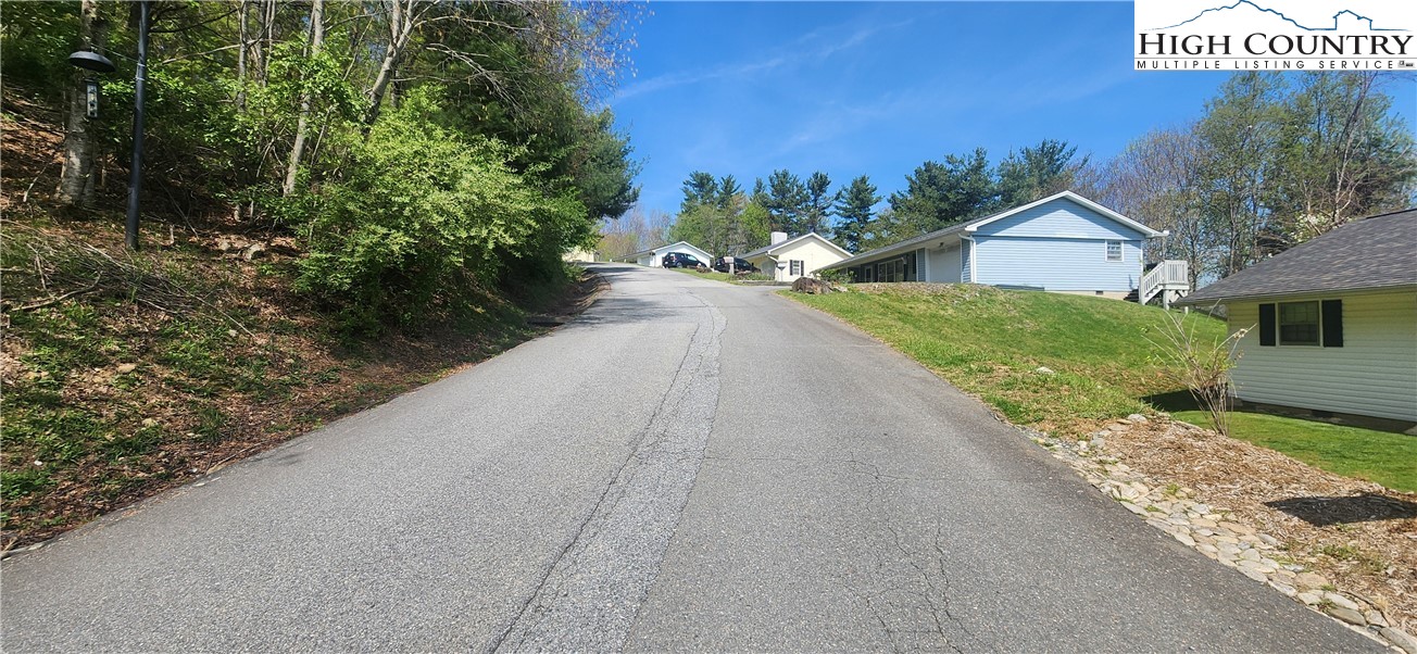 547 White Laurel Lane Boone, NC 28607 - Photo 2 of 5 a view of a street with a house in the background