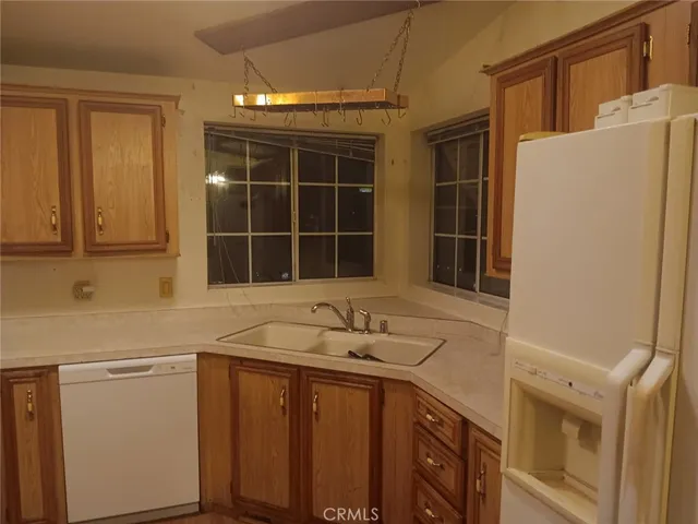 a bathroom with a sink and a window