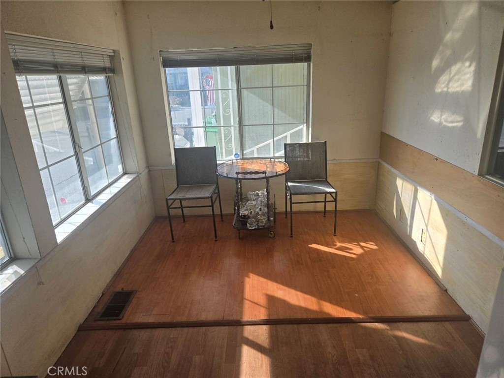 10001 West Frontage Road, Unit 64 South Gate, CA 90280 - Photo 2 of 35 a living room with furniture and a large window