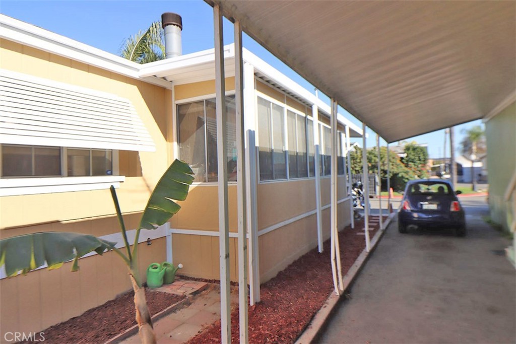 10001 West Frontage Road, Unit 64 South Gate, CA 90280 - Photo 21 of 35 a view of a porch with furniture