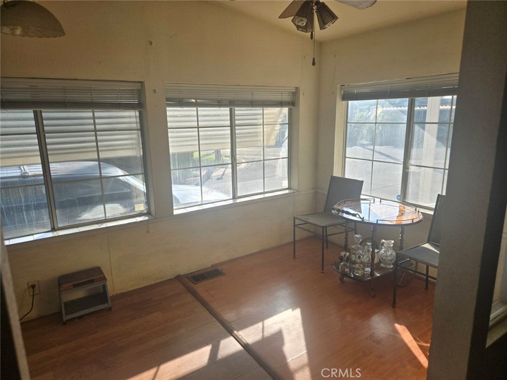 10001 West Frontage Road, Unit 64 South Gate, CA 90280 - Photo 4 of 35 a dining room with furniture and window