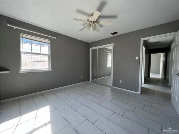 a bathroom with a toilet a sink and a shower