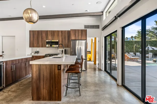 a spacious bathroom with a tub shower and sink