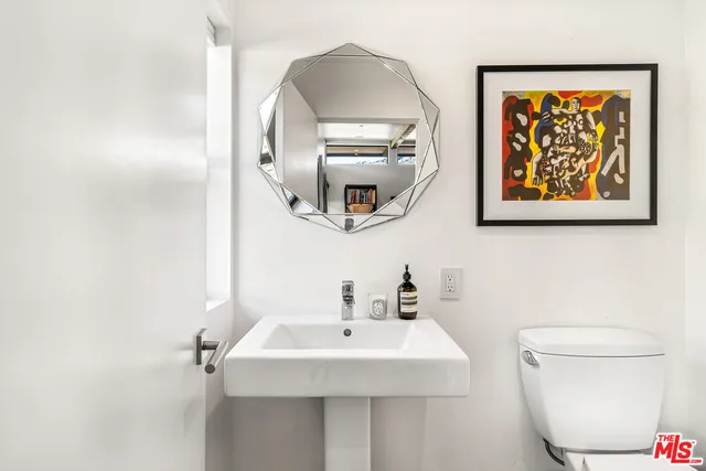 a view of a swimming pool with sitting area