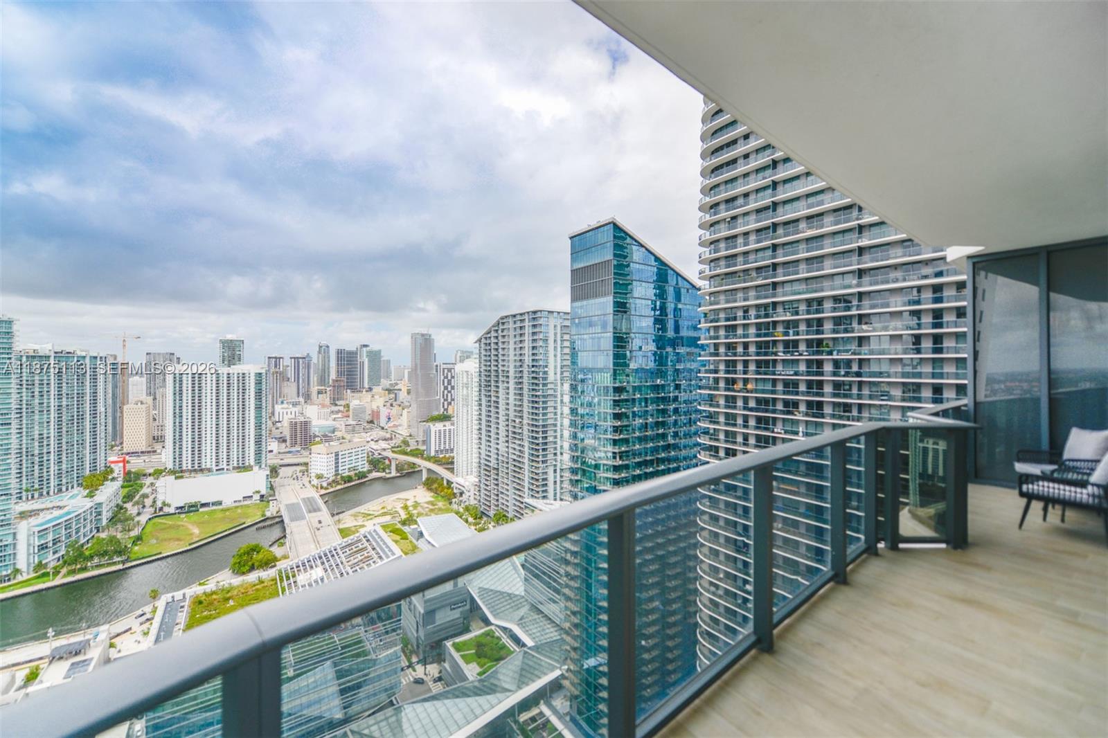 45 Southwest 9th Street, Unit 4108 Miami, FL 33130 - Photo 25 of 28 a balcony with street view and wooden floor