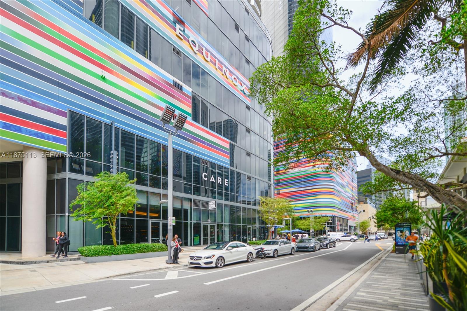 45 Southwest 9th Street, Unit 4108 Miami, FL 33130 - Photo 26 of 28 a tall building with trees in front of it