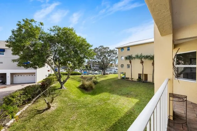 a view of swimming pool from a balcony